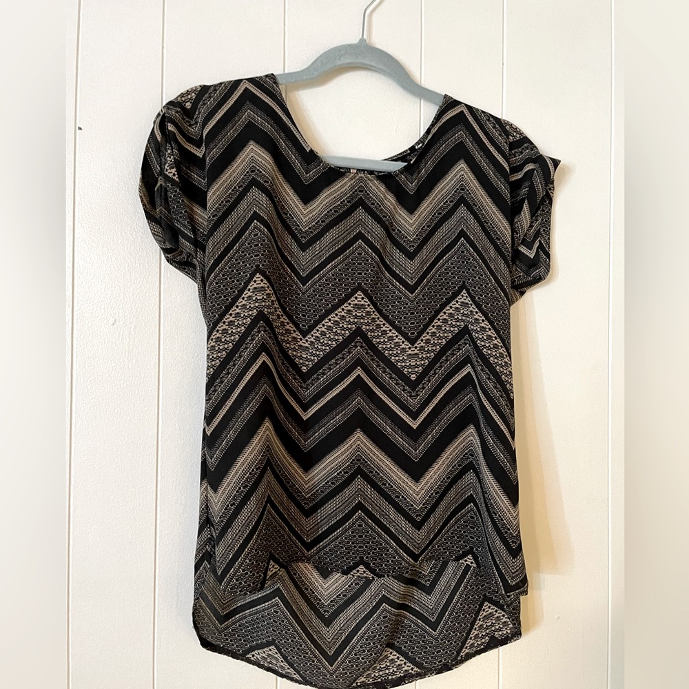 Cute semi sheer top with rolled short sleeves
